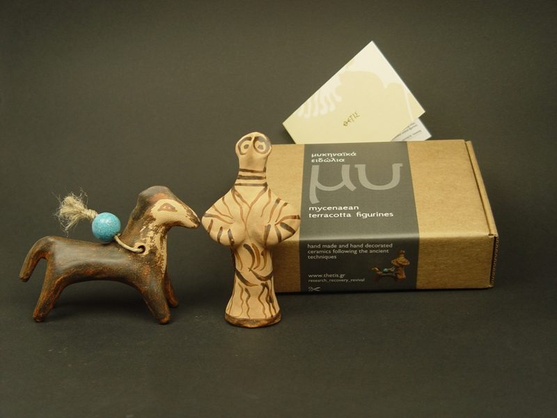 Mycenaean figurines A box with two handmade figurines