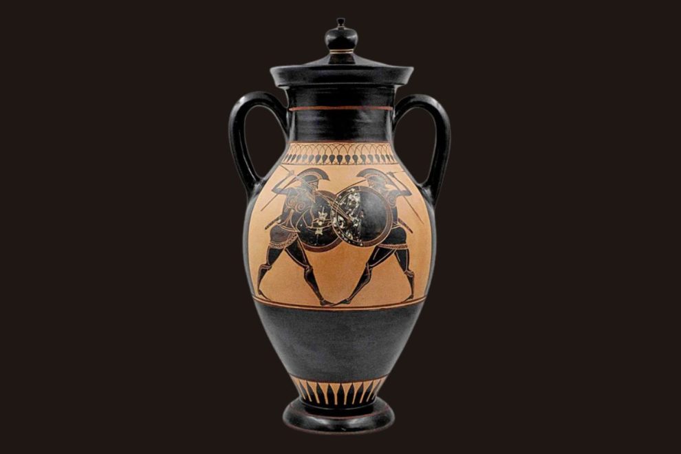 Black-figure amphora Greek vase with lid featuring Dionysus and satyrs, representing ancient Greek ceramic art.