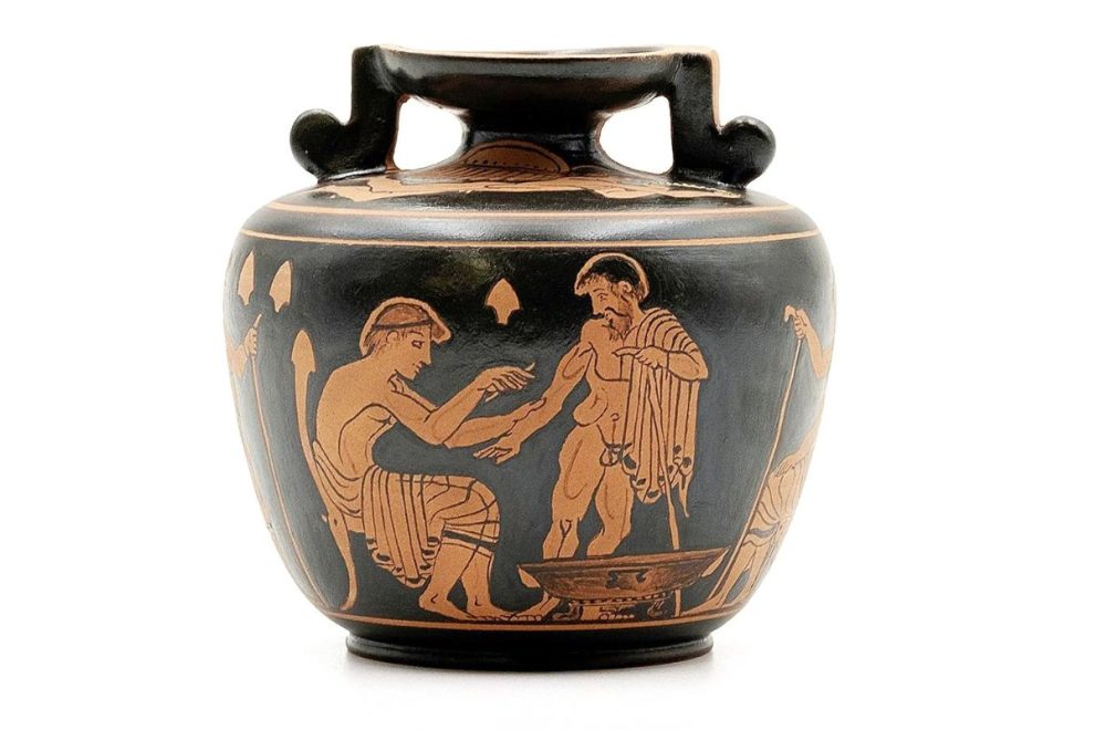 Red-figure aryballos depicting male figures and intimate scenes, reflecting themes of Homoerotic Greek Pottery in classical art.