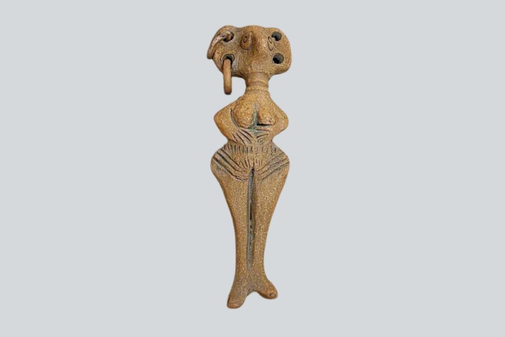 Ancient Cypriot female idol pottery figure.