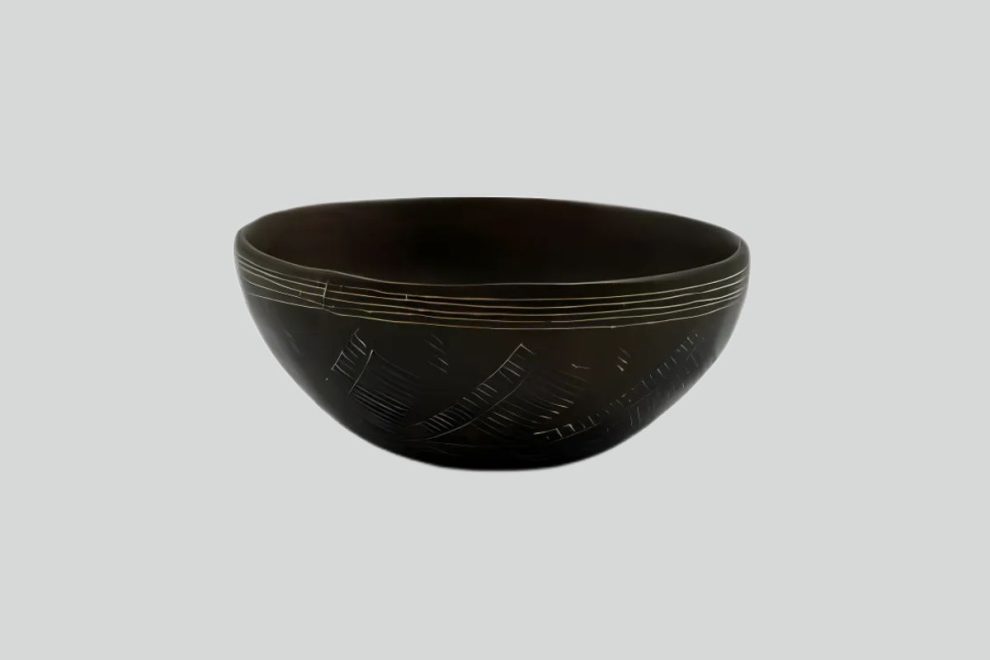 Ancient Cypriot dark incised bowl pottery.