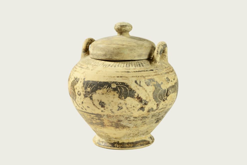 Ancient Corinthian pottery vessel with lid from Greece.