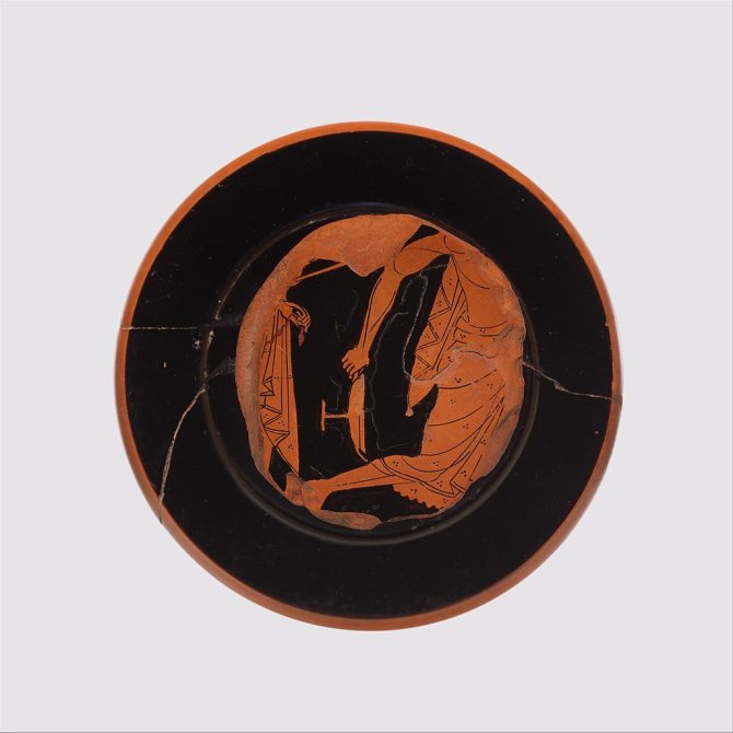 Fragments of an red-figure terracotta kylix (drinking cup)