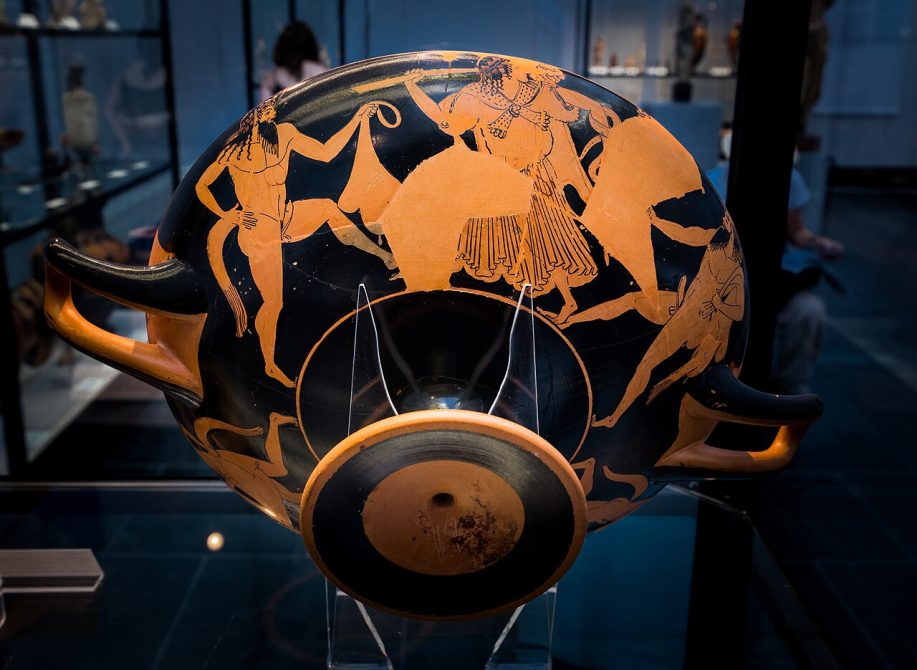 Attic red-figure kylix attributed to the Makron vase painter featuring Dionysos with satyrs and maenads.