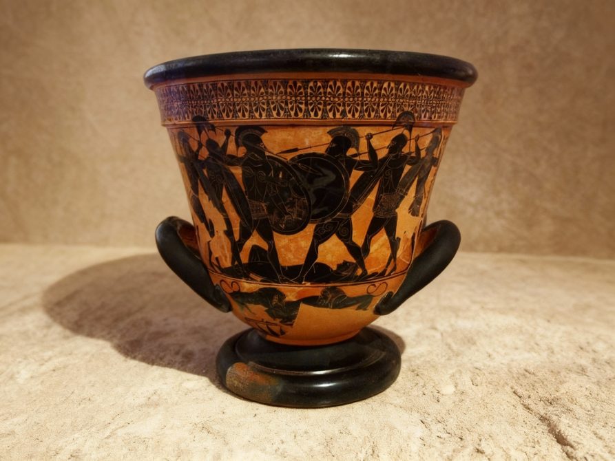 Vases depicting the funeral games for Patroclus, as described in Homer's Iliad, are key examples of early Greek black-figure pottery, notably the famous François Vase (c. 570 BC) and the Sophilos Dinos (c. 6th century BC), which vividly show chariot races and athletic contests organized by Achilles, illustrating epic narratives on ceramic art, with scenes often featuring heroes like Ajax, Hector, and Achilles himself, and representing a popular theme linking myth with funerary rituals.