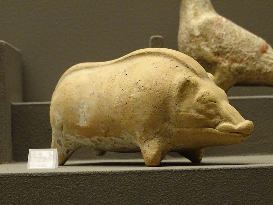 "Pig figurine used as a toy (5th century BCE) at the Museum of Cycladic Art, Athens."