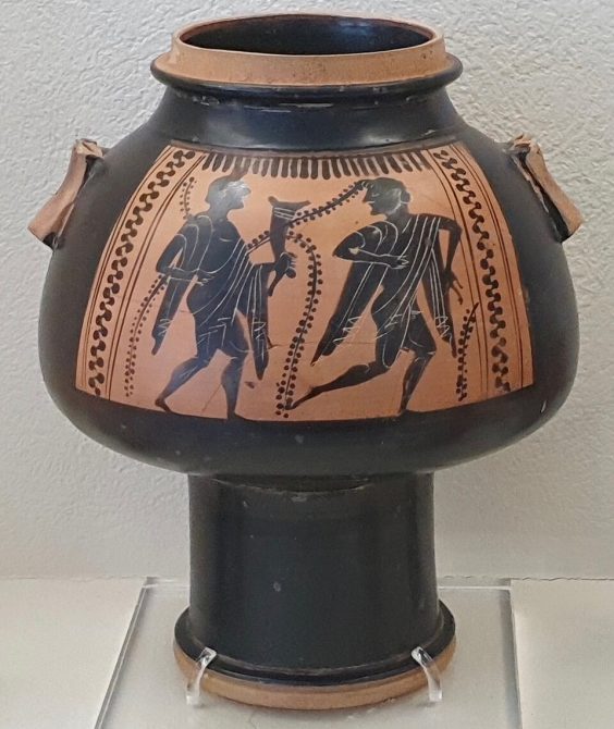 Attic black-figure psykter with revellers (komos) scene, 500–475 BC.