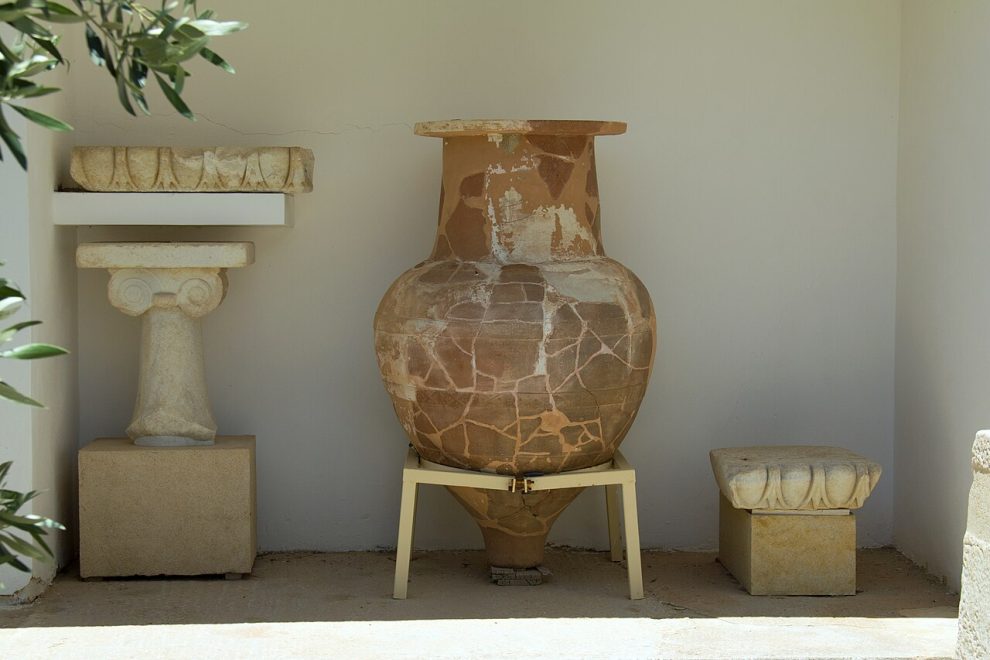 Large ancient Greek pithos and architectural fragments at the Archaeological Museum of Paros
