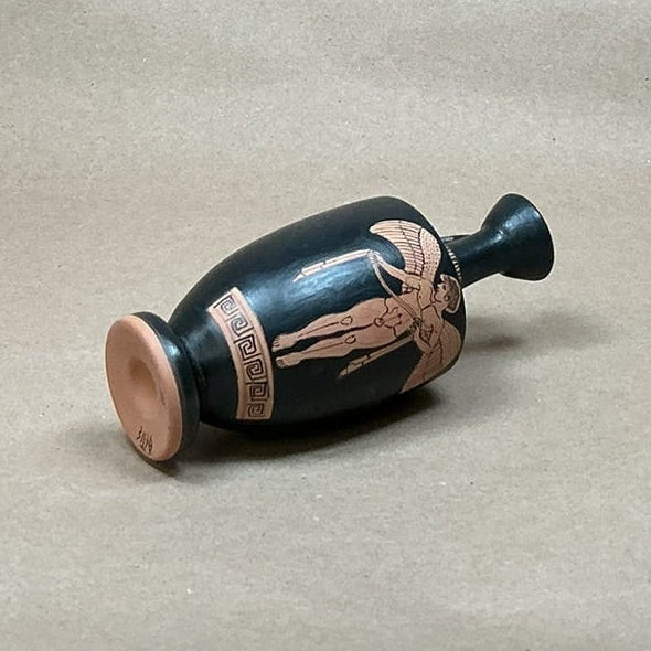Ancient Greek black-figure lekythos depicting Eros and a winged figure.